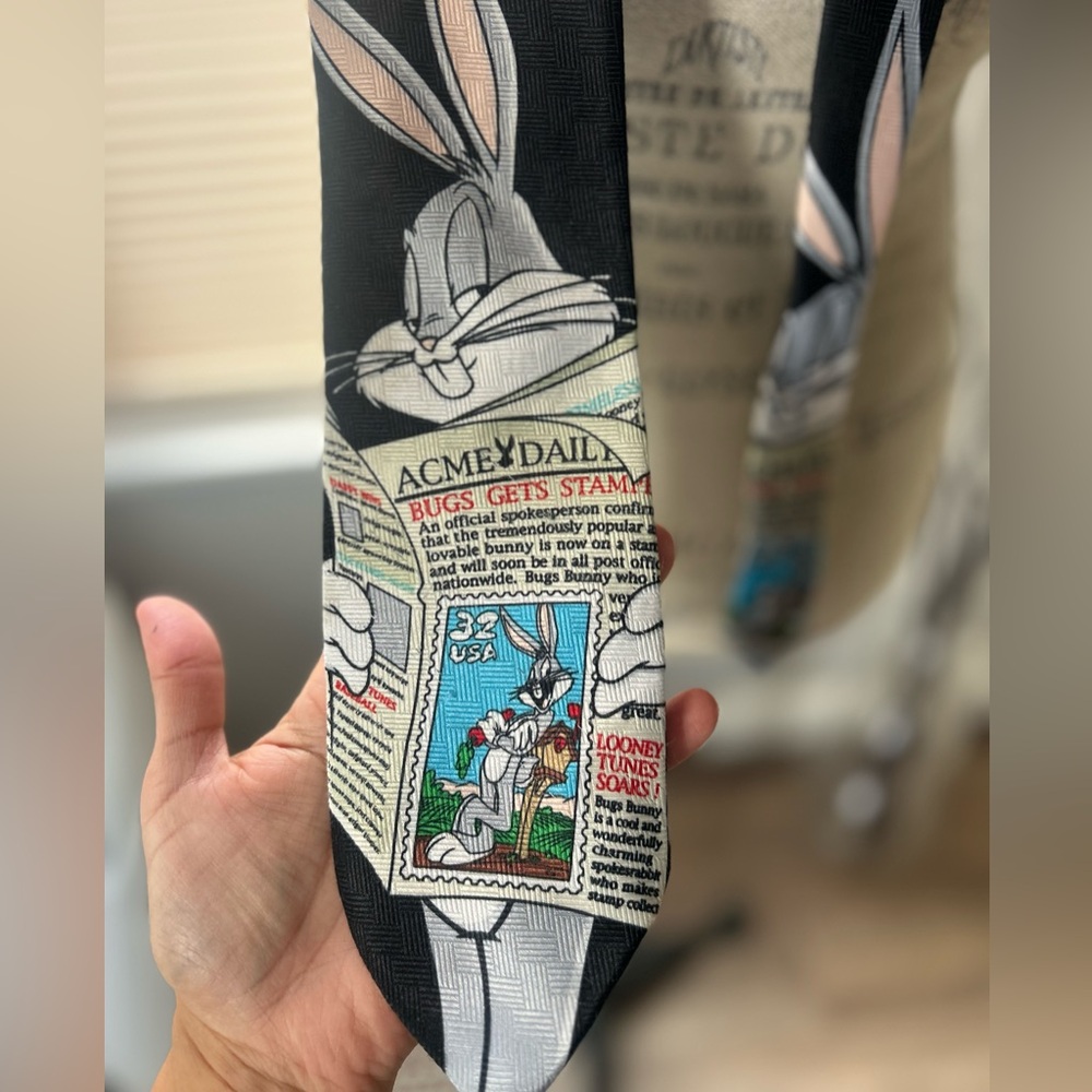 This is a vintage 1997 Looney Tunes Stamp Collection Bugs Bunny tie